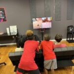 Kids playing Nintendo Switch